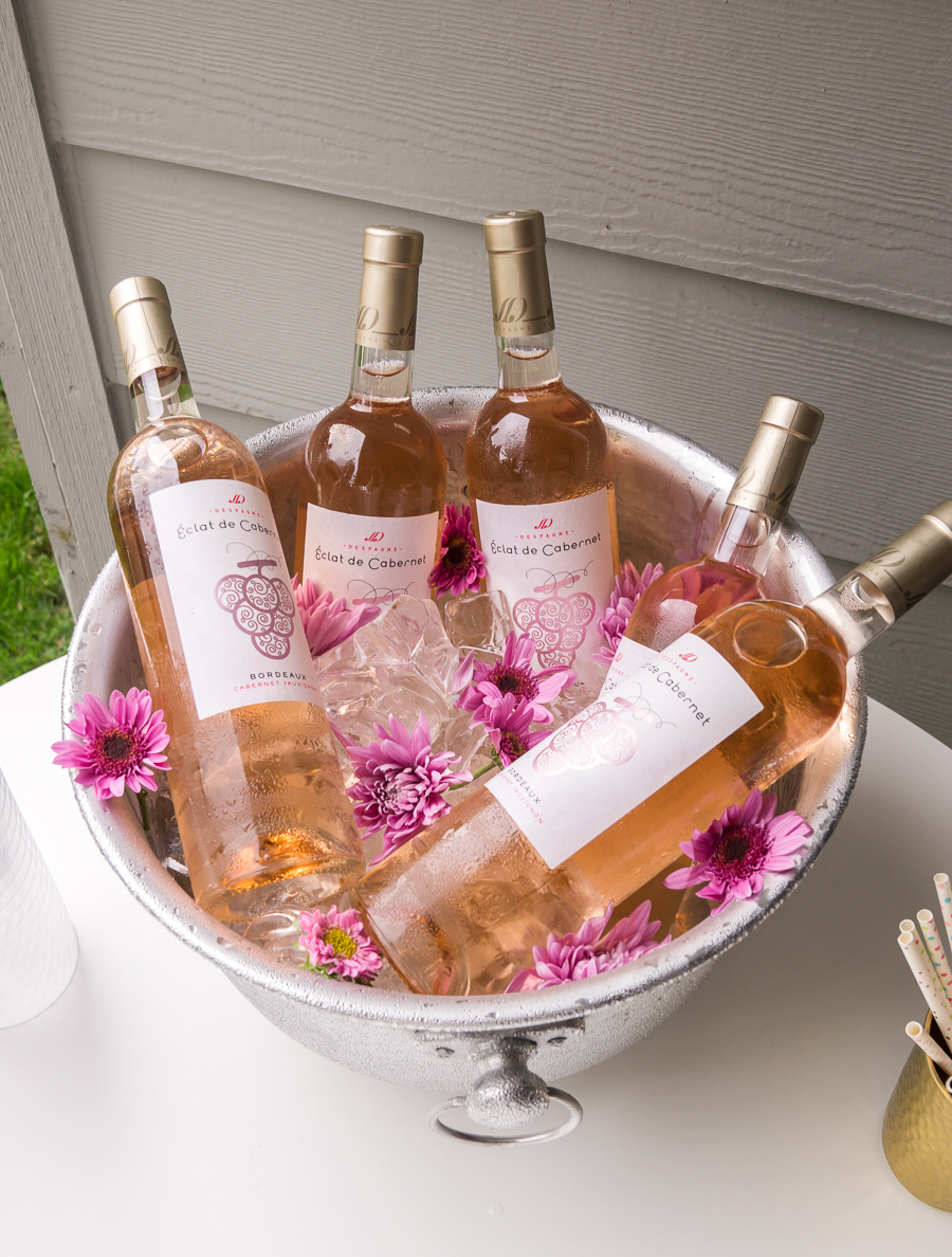 Metal drink tub, Eclat de Carbernet, flowers and ice, bridal shower drink station